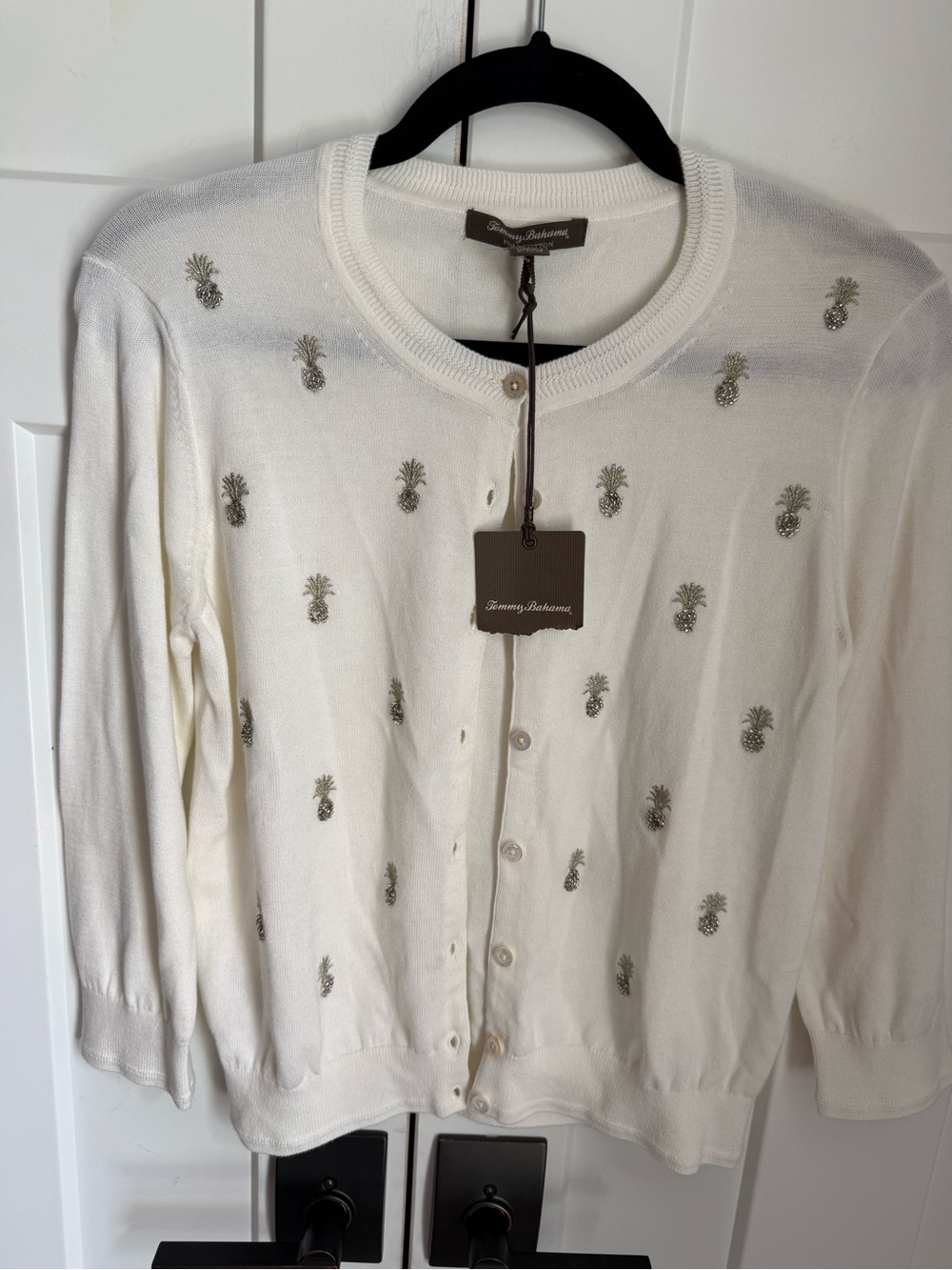Tommy Bahama Cream Button-Front Pima Cotton Top with pineapple embellishments.